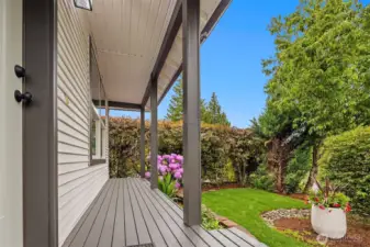 Cute covered porch and nice landscaping make this home turn key and quaint