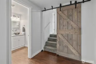 The powder room is just off the kitchen and entrance to the living quarters.
