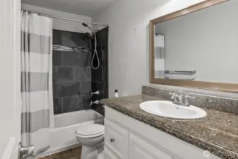 Guest Bathroom next to bedroom 2.