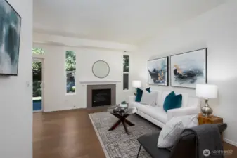 Upon entering your new townhome cozy up in your living room next to your gas fire place.