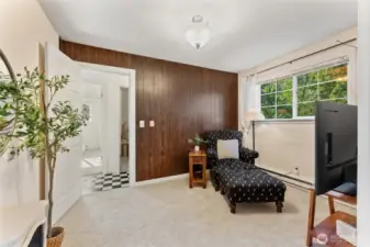 Versatile bonus room with natural light, cozy carpet, and flexible use for office, media, or guest space.