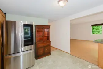 The hutch next to the refrigerator stays.