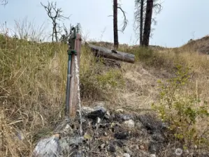 Good water!! The frost-free spigot is fed from a 1000 gallon buried cistern, which in turn can be filled by connecting a generator or solar and inverter to the well.