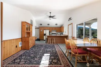 Pine wainscoting accents the walls in dining area.