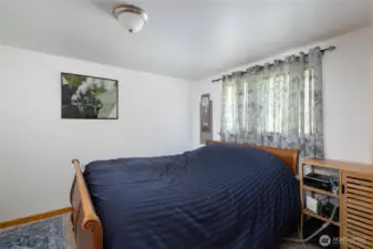 Bedroom 2 (used as primary) near bathroom.