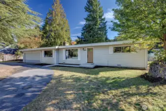 Circular driveway with attached 2-car garage