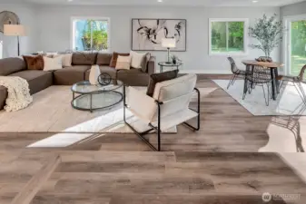Perspective from dining area to the integrated family room/great room