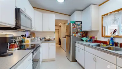 The kitchen with stainless steel appliances!