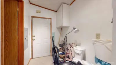 Mudroom next to the garage. This home has lots of storage!