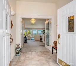 Tiled Flooring Entry W/ Double Doors.