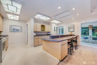 Extra Large Kitchen Area w/Sitting Bar & Entrance To Sun Room.