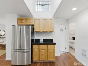 Notice the stained glass above the cabinets, this home held onto all the original charm
