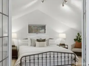 French doors lead to bedroom two (upper floor)