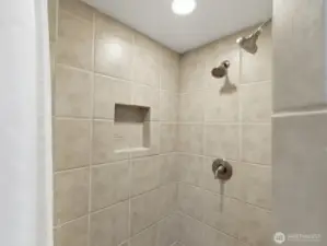 Dual shower heads in the tile shower