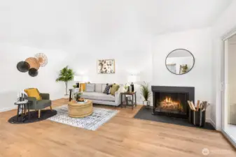 Wood burning fireplace in the main living space, perfect for entertaining.
