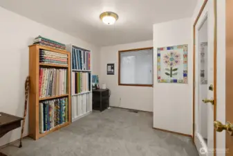 Main Floor Bedroom with door to deck