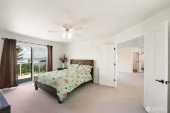 The spacious primary bedroom has its own private deck, full ensuite and large walk-in closet.