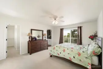 The spacious primary bedroom has its own private deck, full ensuite and large walk-in closet.