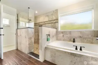 The 5 piece luxury ensuite attached to the primary bedroom.