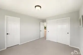 The spacious second bedroom.