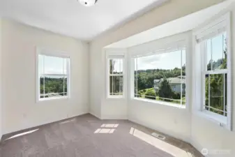 The spacious and bright office on the main floor has lovely views.