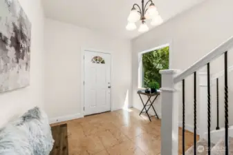 Spacious foyer. House is virtually staged