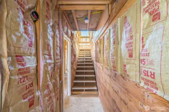 Entry to addition, end of hallway past bedrooms