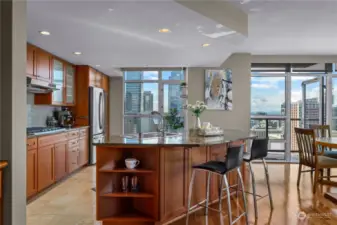 kitchen with slab granite counters and island