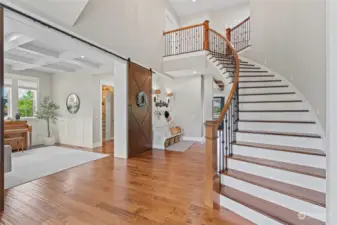 Beautiful grand entry with formal living on the right, and office to the left.