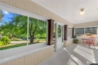 Large front porch overlooking the front and side lawns.