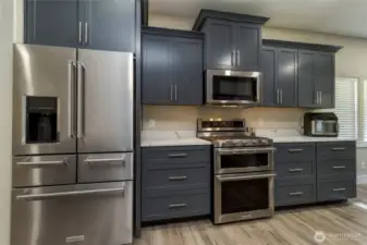 So much storage in this kitchen. Even a wall of shelving that you don't see in the photos. Come check it out.