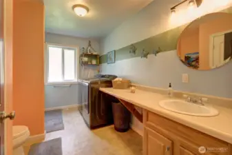 Full bath with laundry.