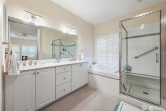 Primary bathroom with 2 sinks, shower and soaking tub