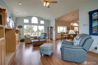 Looking to the West side of the living area, we have another set of big, beautiful windows to capture the ocean views and sunsets.  There is also a slider out to the top level deck.