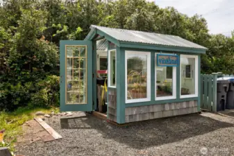 Heading back to ground level to explore more of the exterior, you will find a wonderful greenhouse to help you with your gardening!