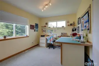 Heading up to the second floor, you will find three bedrooms, including the primary suite, two bathrooms, and the laundry/utility room.