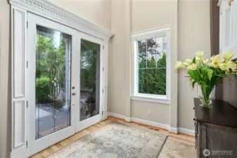 Once inside the leaded glass doors you will notice the refinished solid hardwood floors, sparkling new windows (South side windows replaced), tall ceilings and abundant custom molding and trim.