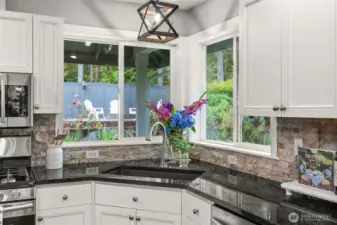 enjoy the view of your beautiful backyard with tons of cutting flowers