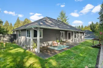 enjoy the covered patio in your private backyard