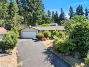 Spacious 2-car garage and long driveway with ample room for all your vehicles!