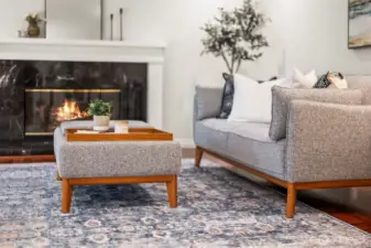 Living room with wood burning fireplace (gas available, too)