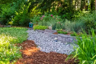 Beautiful and Purposeful Pollinator garden surround the property - Low Maintenance!