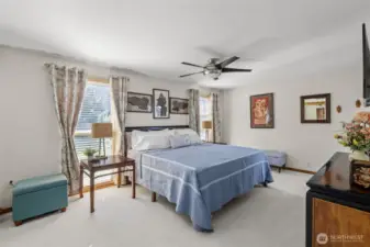 Primary Bedroom with King sized bed.