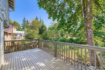 Spacious backyard deck overlooking the greenbelt.