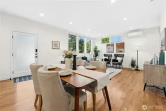 Dining room has the ability to host a small or large group, with your expandable table.