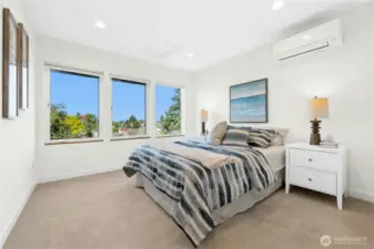 On the third floor, you'll find a second bedroom. Notice the zone heating/cooling unit. Each bedroom has its own!