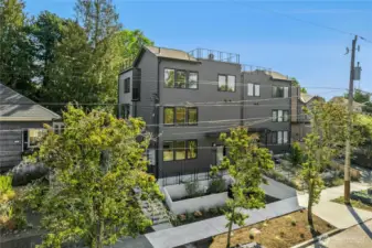 In front of your building, you can personalize your little greenspace. Currently shown with easy-care landscaping.