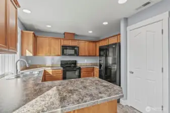 Tons of cabinetry and a walk-in pantry.