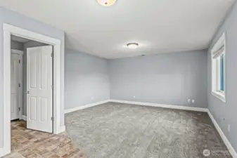 Second Living Room with Laundry and Garage Access