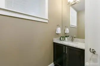 Powder room at entry level.
